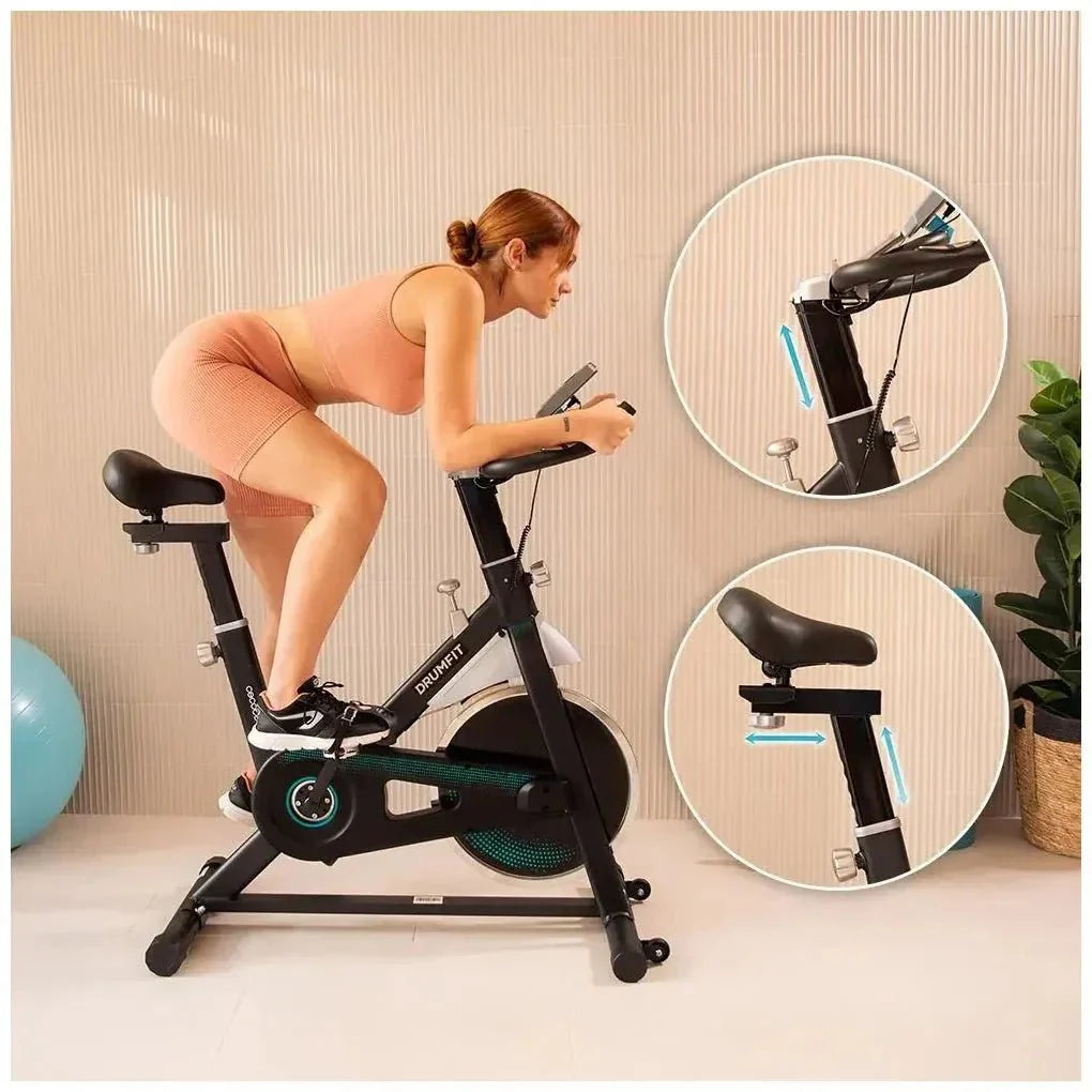 Bicicleta estática Indoor DrumFit 13000 Delfos con volante de inercia de 13 kg sistema Silence Fit y pantalla LCD de Cecotec