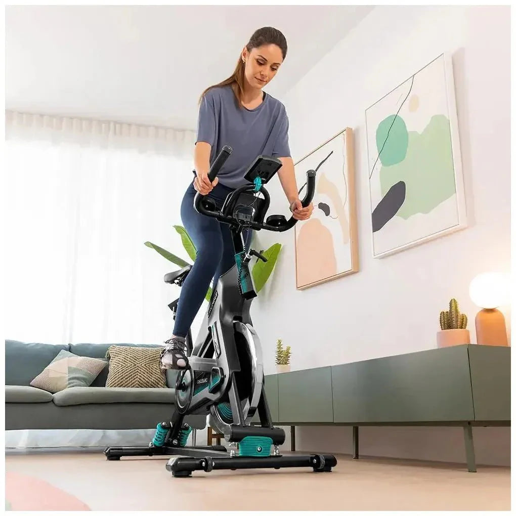 Bicicleta estaticaDrumFit 23000 Kosmos Pro UltraFlex con volante de 23 kg tecnología Dynamic Pro y pantalla LCD Cecotec