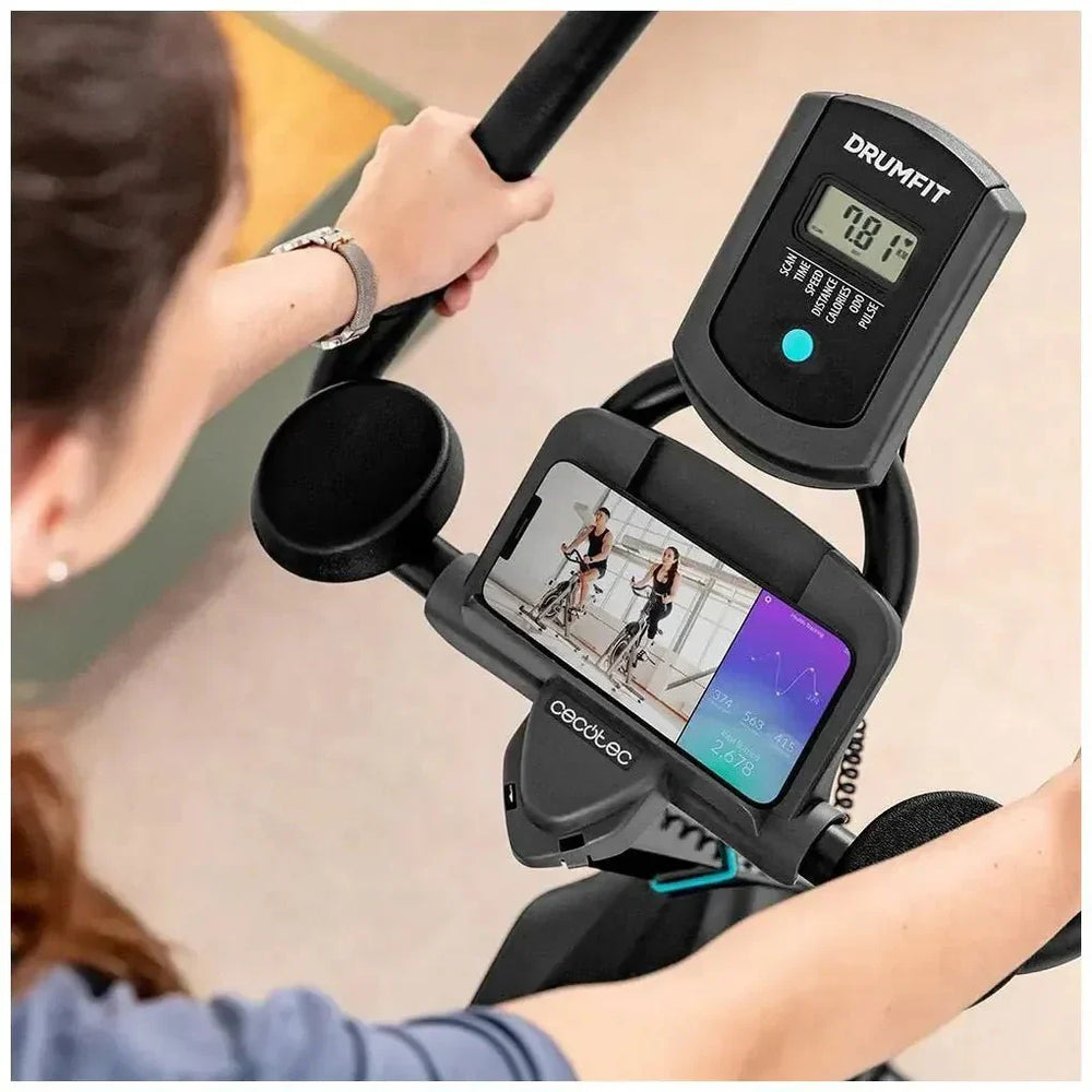 Bicicleta estaticaDrumFit 23000 Kosmos Pro UltraFlex con volante de 23 kg tecnología Dynamic Pro y pantalla LCD Cecotec