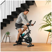 Bicicleta estatica DrumFit 6000 Forcis con volante de inercia de 6 kg resistencia manual monitor LCD y calapiés Cecotec