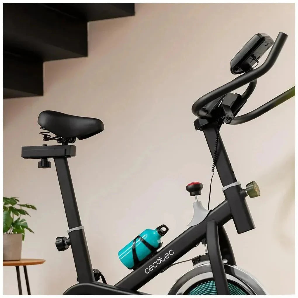 Bicicleta estatica DrumFit 6000 Forcis con volante de inercia de 6 kg resistencia manual monitor LCD y calapiés Cecotec