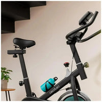Bicicleta estatica DrumFit 6000 Forcis con volante de inercia de 6 kg resistencia manual monitor LCD y calapiés Cecotec