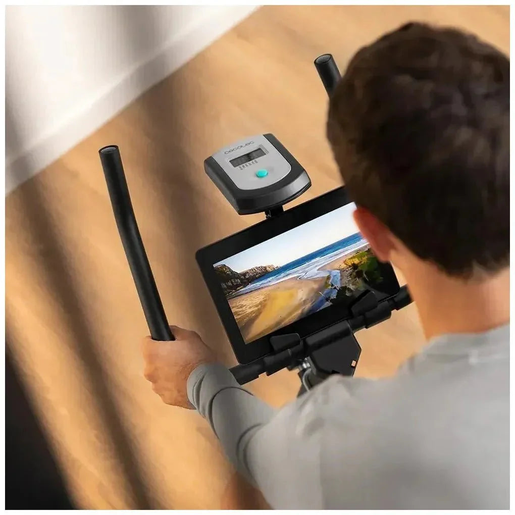 Bicicleta estatica DrumFit 6000 Forcis con volante de inercia de 6 kg resistencia manual monitor LCD y calapiés Cecotec