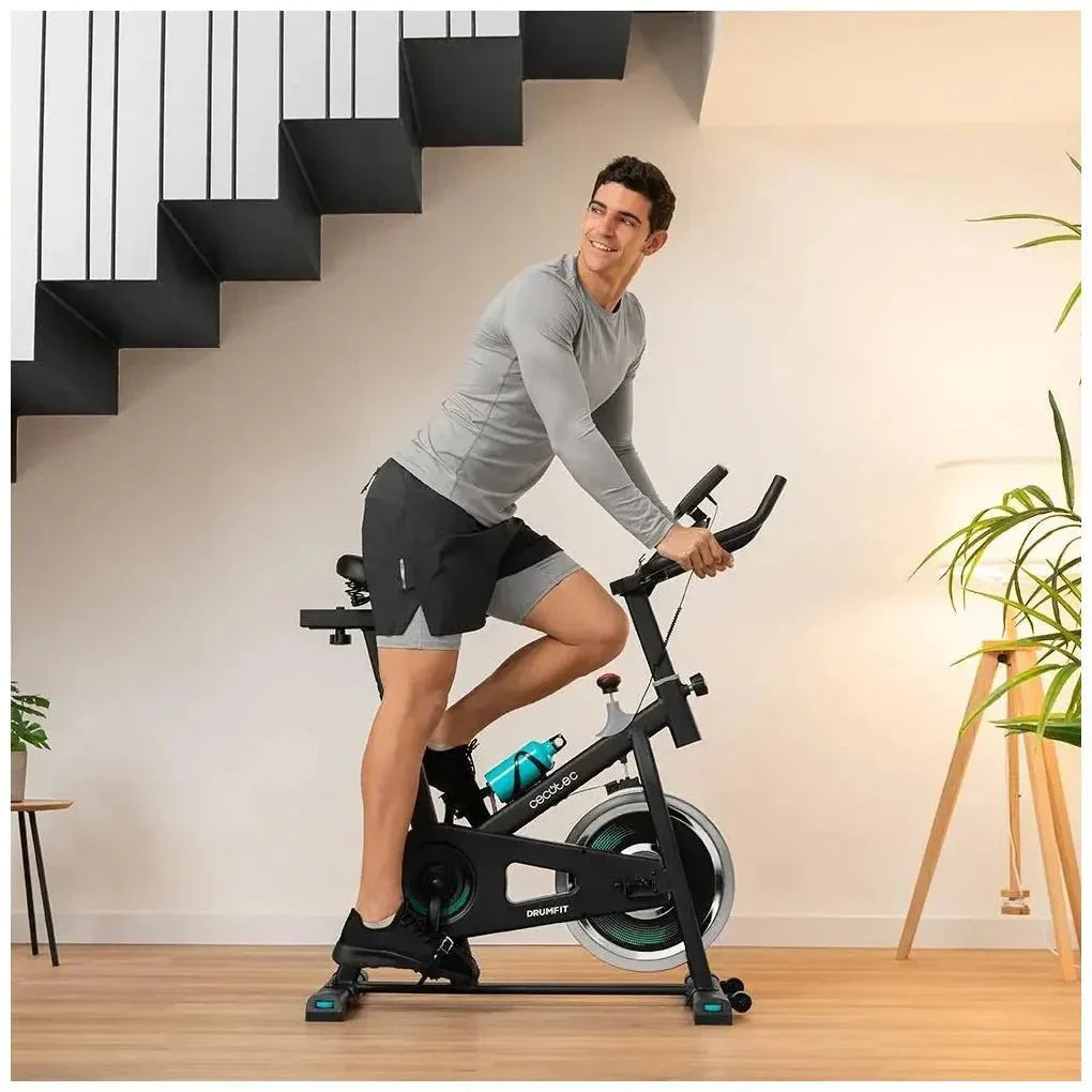 Bicicleta estatica DrumFit 6000 Forcis con volante de inercia de 6 kg resistencia manual monitor LCD y calapiés Cecotec