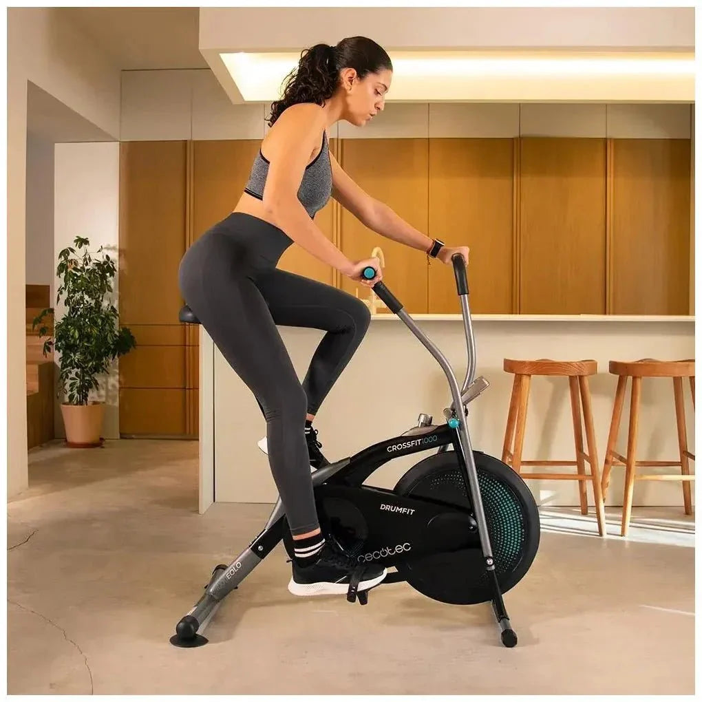 Bicicleta estatica Drumfit CrossFit 1000 Eolo con resistencia ajustable pantalla LCD y pedaleo bidireccional Cecotec