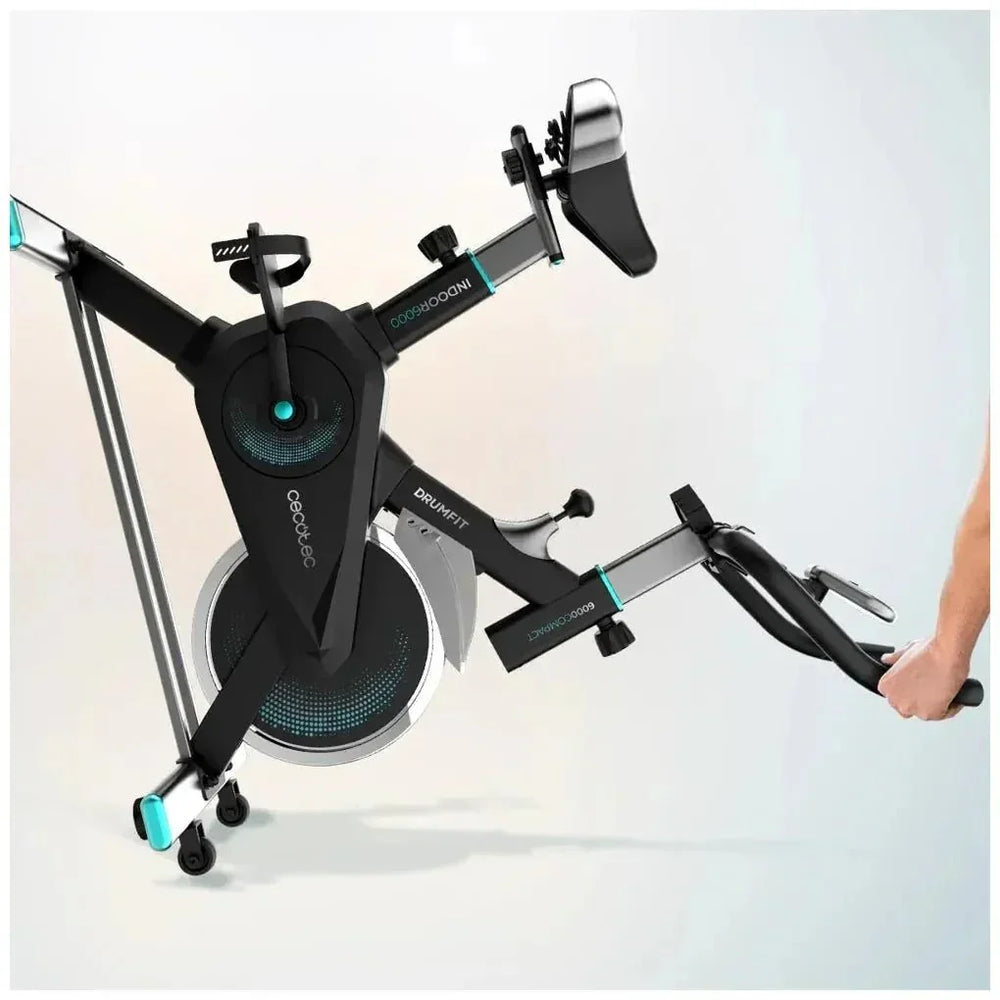 Bicicleta estatica Indoor DrumFit 6000 Compact con volante de inercia de 6 kg pantalla LCD y diseño compacto Cecotec
