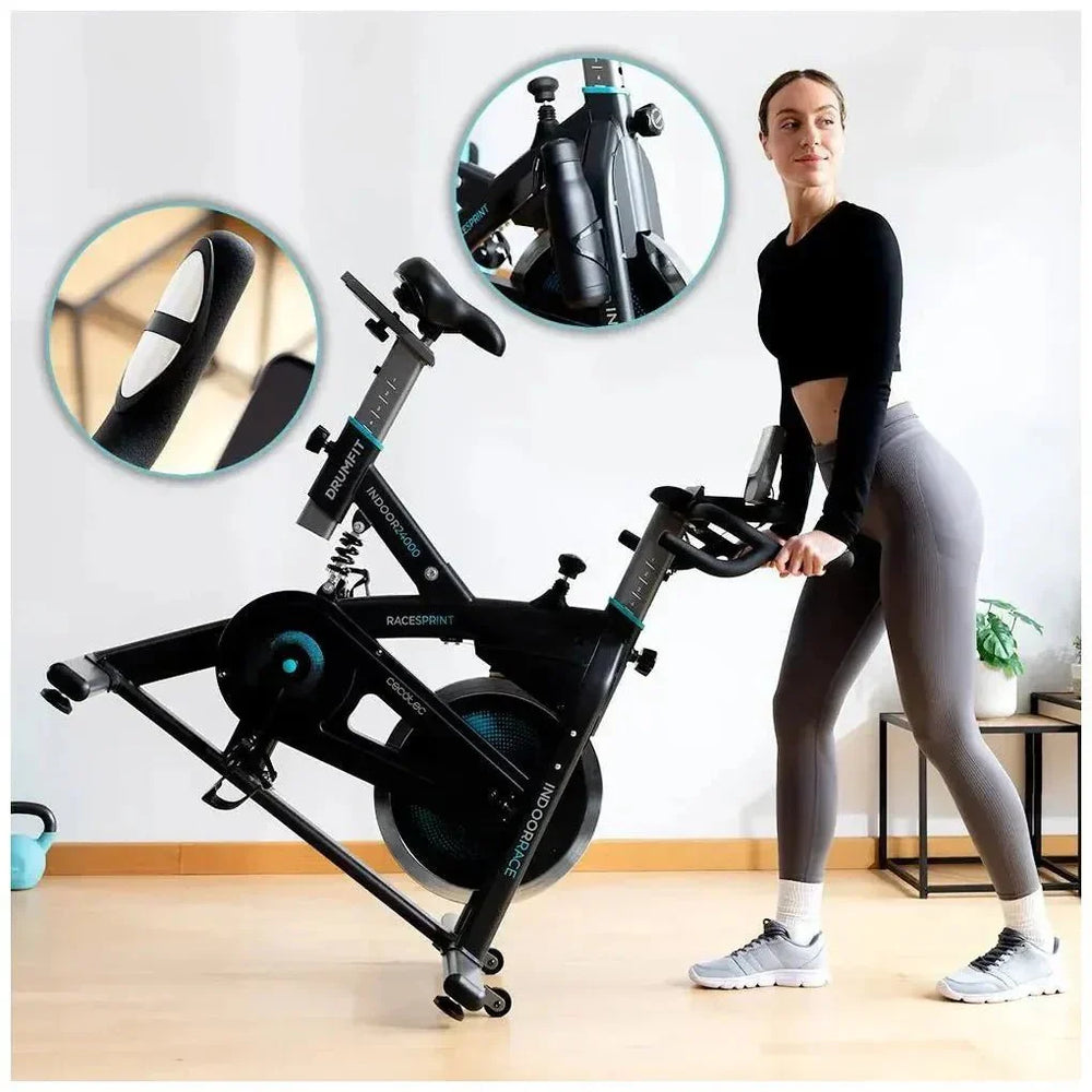 Bicicleta estatica Indoor DrumFit 24000 Race Sprint con volante de inercia de 24 kg y conectividad APP Kinomap Cecotec