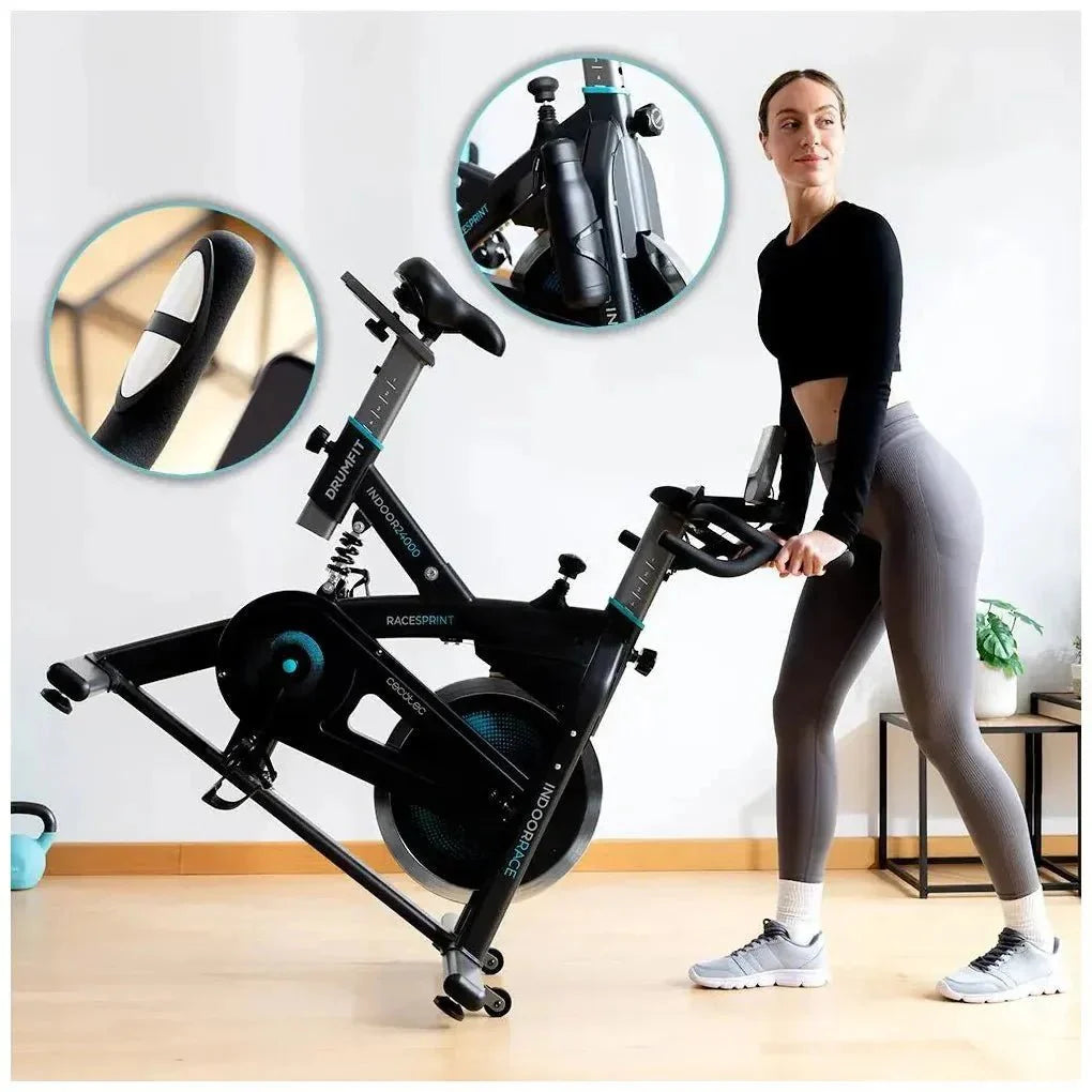 Bicicleta estatica Indoor DrumFit 24000 Race Sprint con volante de inercia de 24 kg y conectividad APP Kinomap Cecotec