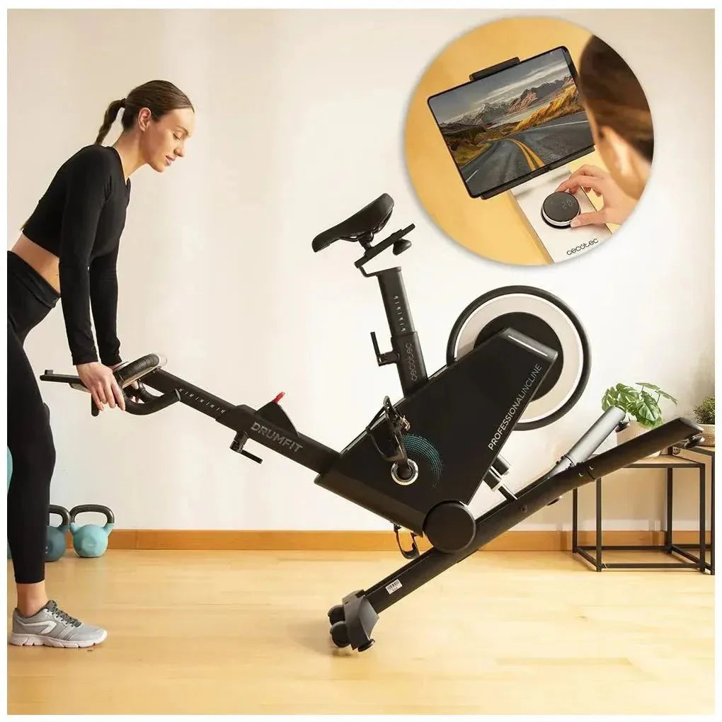 Bicicleta estatica Profesional DrumFit con volante de aluminio de 10 Kg inclinación motorizada y conexión APP Cecotec