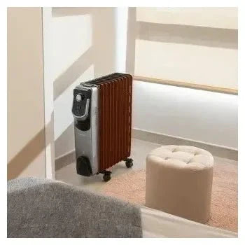 Radiador eléctrico de aceite con 11 módulos en color negro readywarm 11000 space 360 de Cecotec